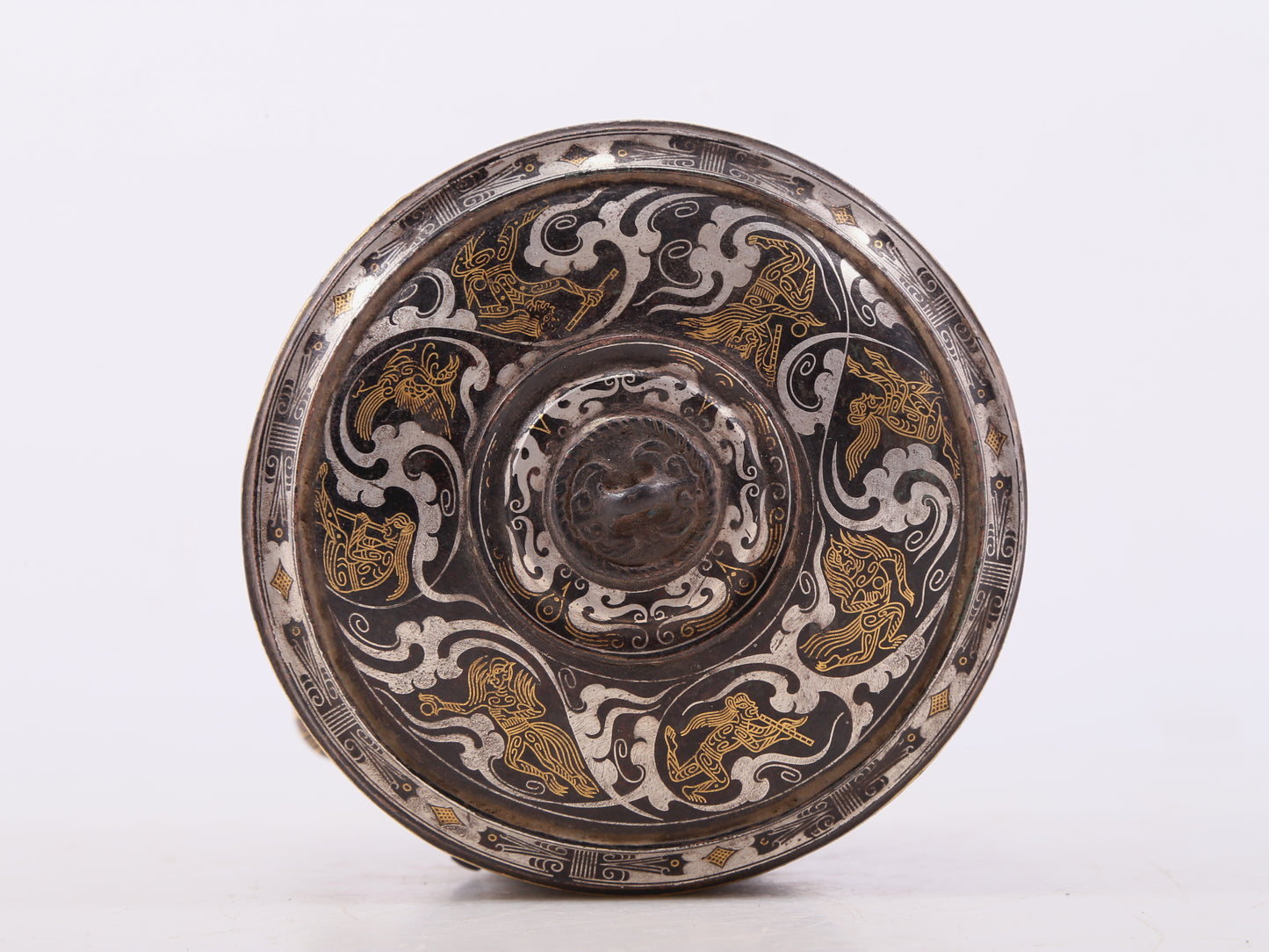 An exquisite bronze inlaid gold and silver tripod jar with auspicious clouds and animal patterns with lid