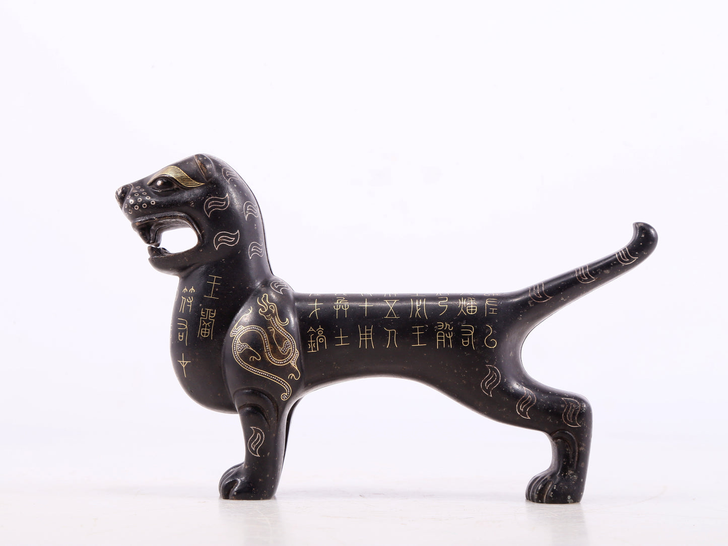 An exquisite bronze inlaid gold tiger charm