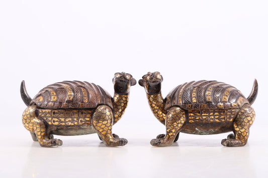 A pair of exquisite bronze-inlaid gold and silver auspicious animal boxes