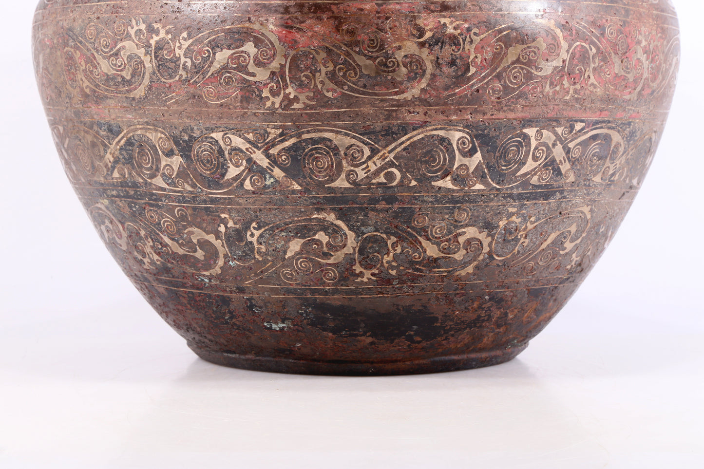 An exquisite bronze inlaid silver basin with floral patterns