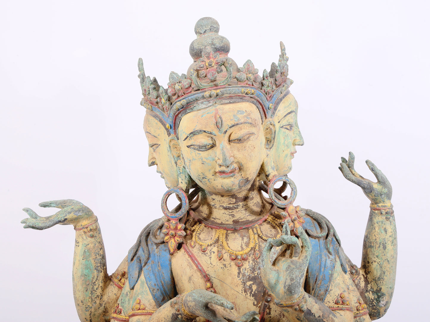 A solemn bronze painted eight-armed Guanyin statue