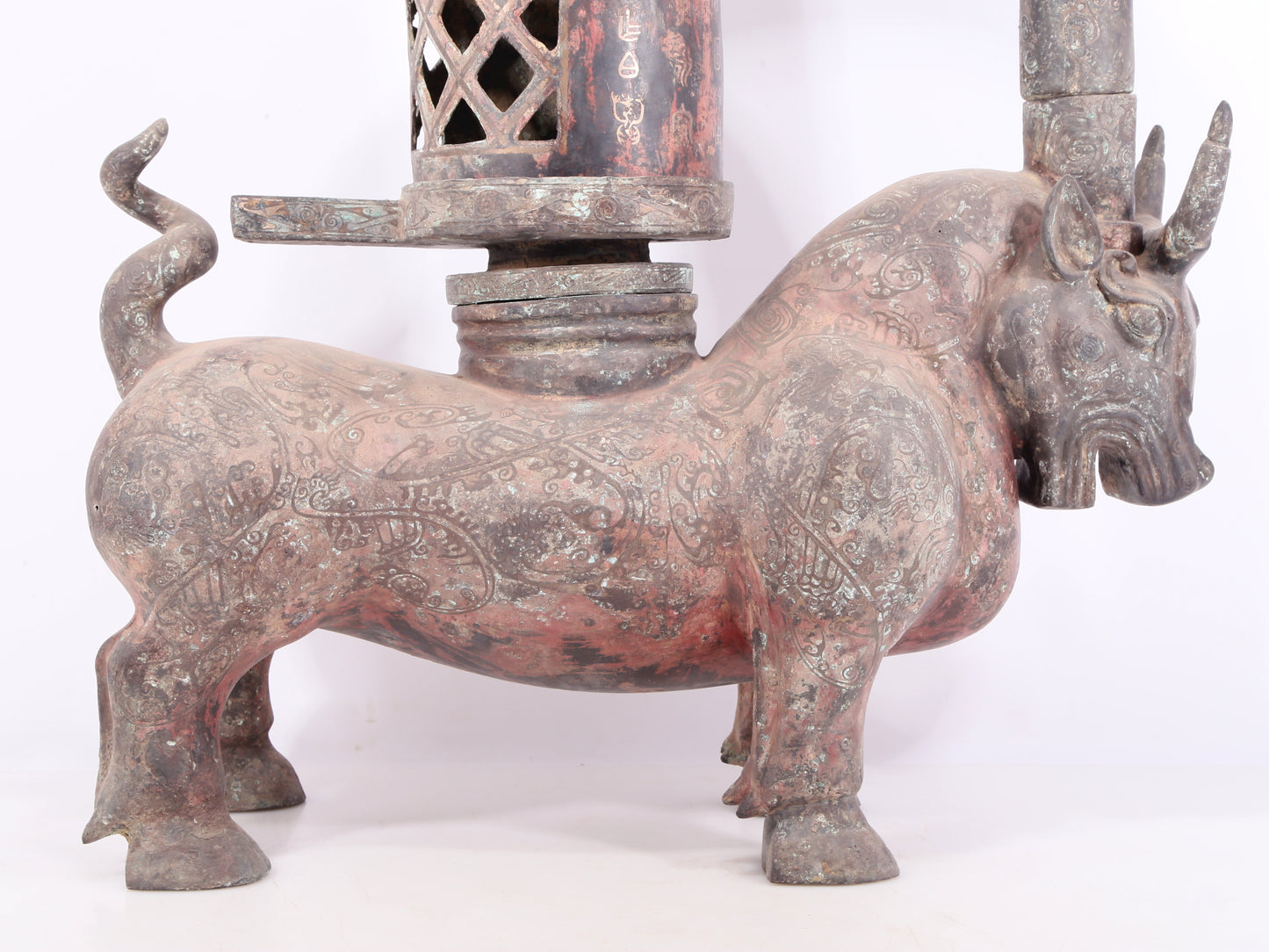 An exquisite bronze inlaid silver bull-shaped palace lantern