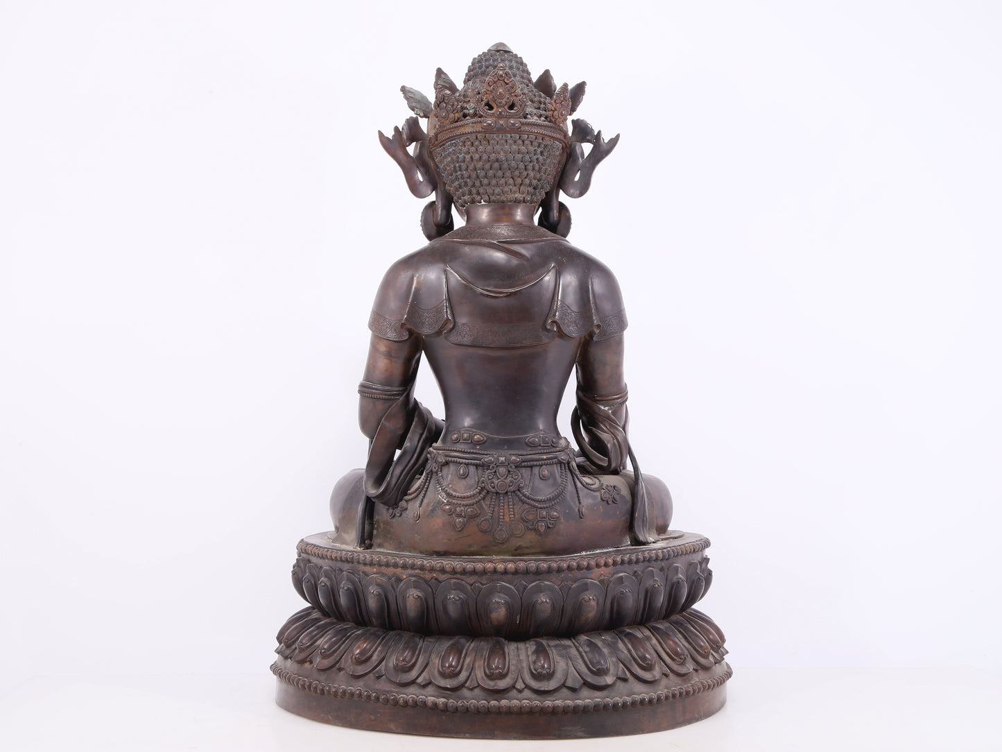 A solemn bronze Buddha statue