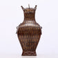 An exquisite bronze inlaid gold and silver animal ear bottle with lid