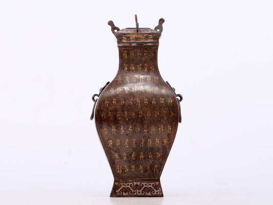 An exquisite bronze inlaid gold and silver animal ear bottle with lid