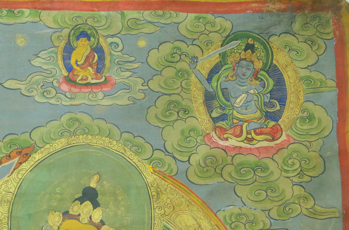 An Exquiste Painted Gold Manjushri Bodhisattva with Four Arms Thangka