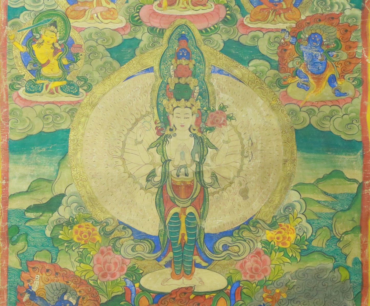 An Exquiste Painted Gold Thousand-armed Avalokiteshvara Thangka