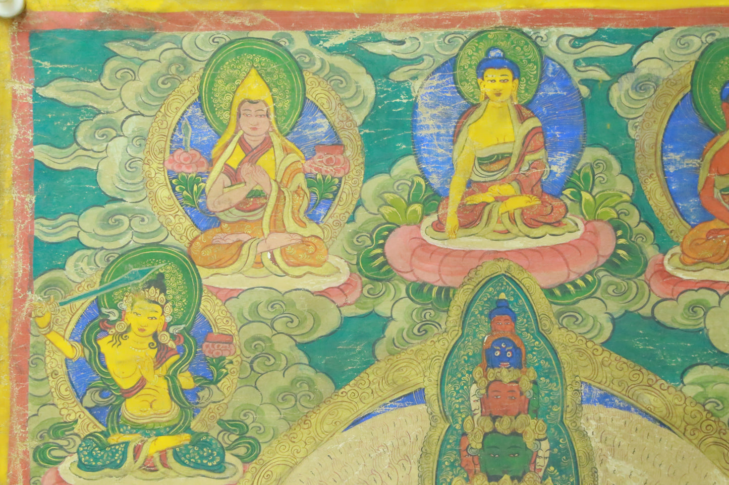 An Exquiste Painted Gold Thousand-armed Avalokiteshvara Thangka