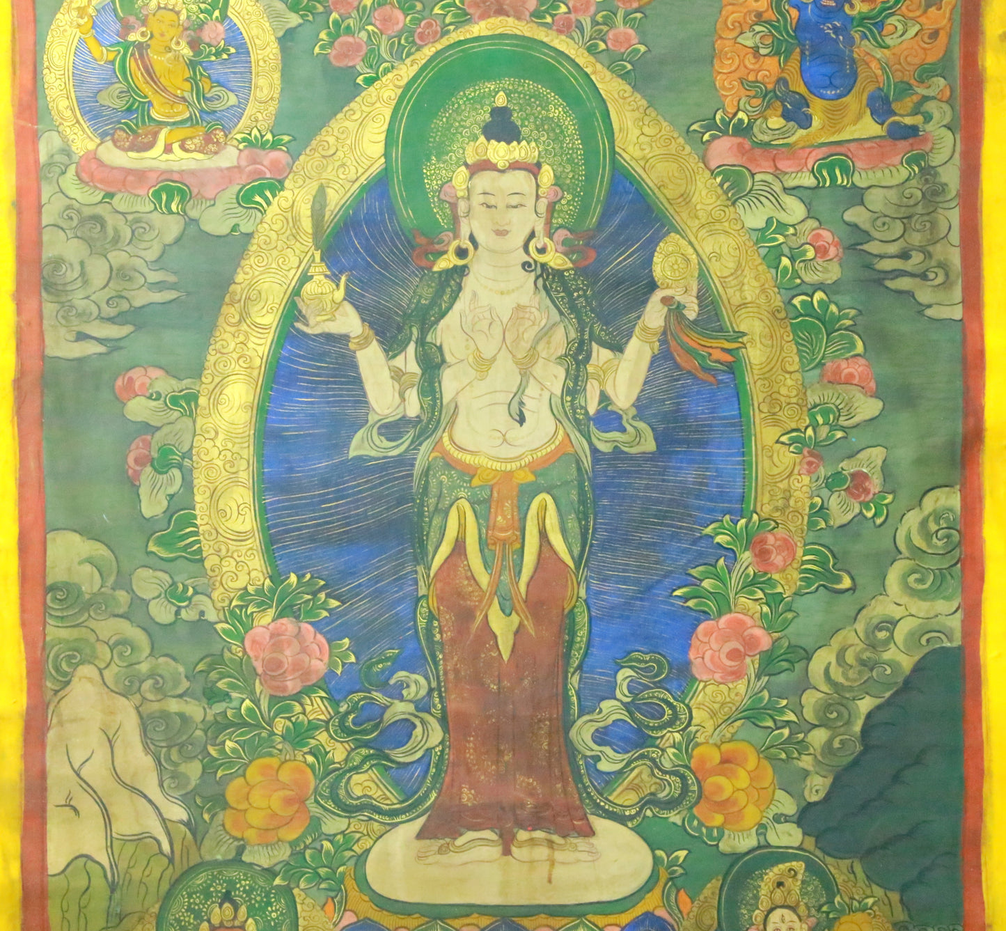 An Exquiste Painted Gold Four-Armed Avalokiteshvara Thangka