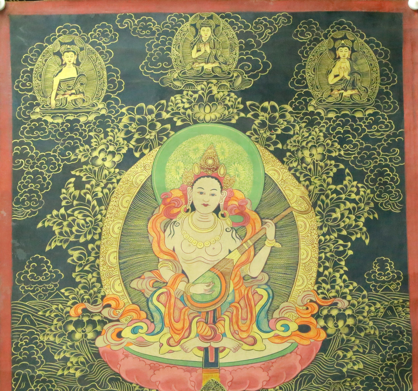 An Exquiste Painted Gold Avalokiteshvara Thangka