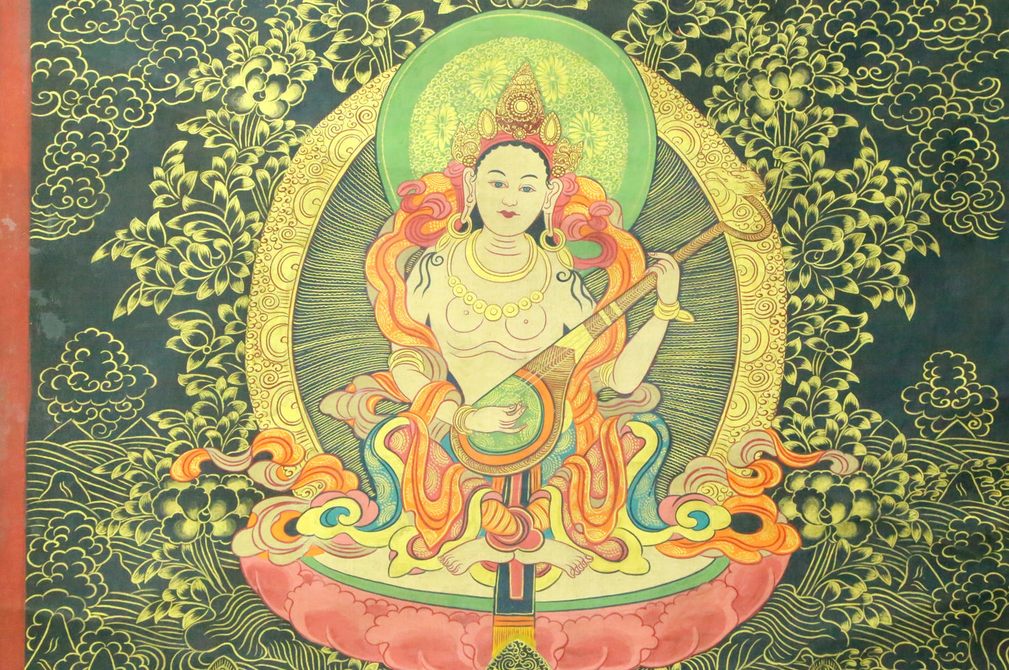 An Exquiste Painted Gold Avalokiteshvara Thangka