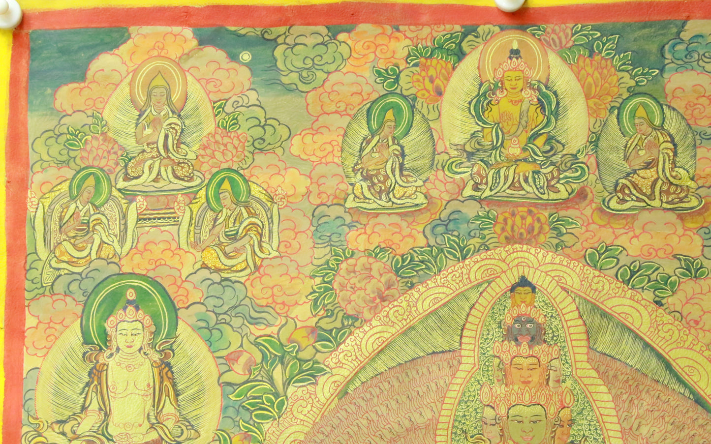 An Exquiste Painted Gold Thousand-armed Avalokiteshvara Thangka