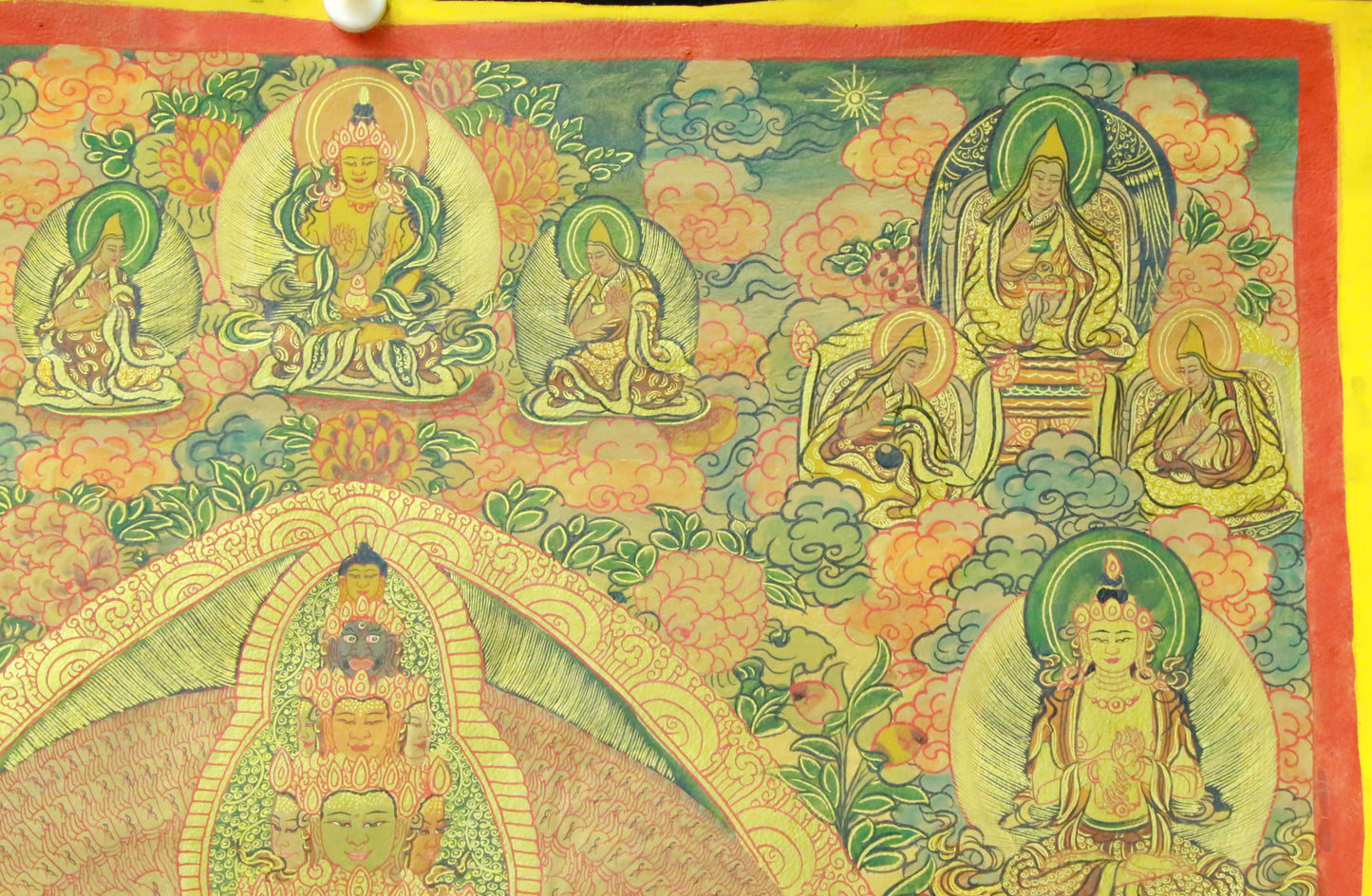 An Exquiste Painted Gold Thousand-armed Avalokiteshvara Thangka