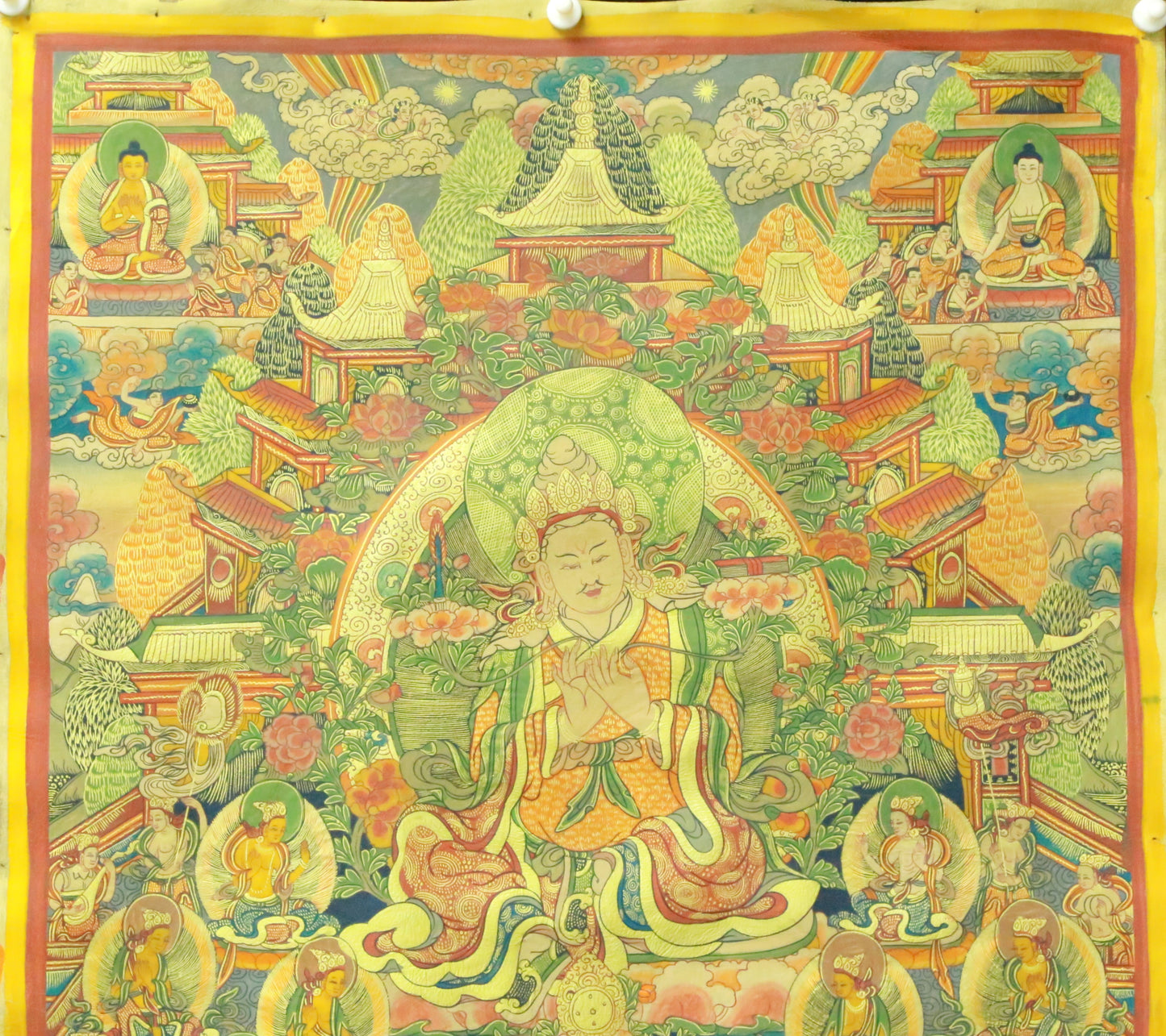 An Exquiste Painted Gold Padmasambhava Thangka