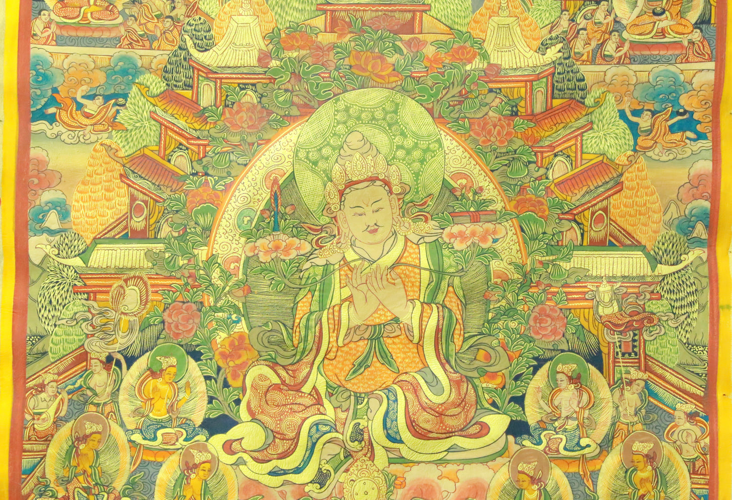 An Exquiste Painted Gold Padmasambhava Thangka