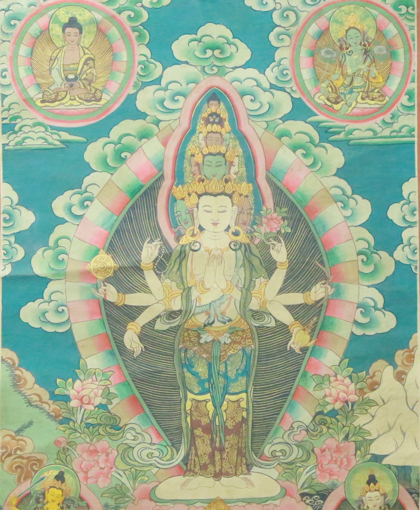 An Exquiste Painted Gold Eleven-faced Avalokiteshvara Thangka