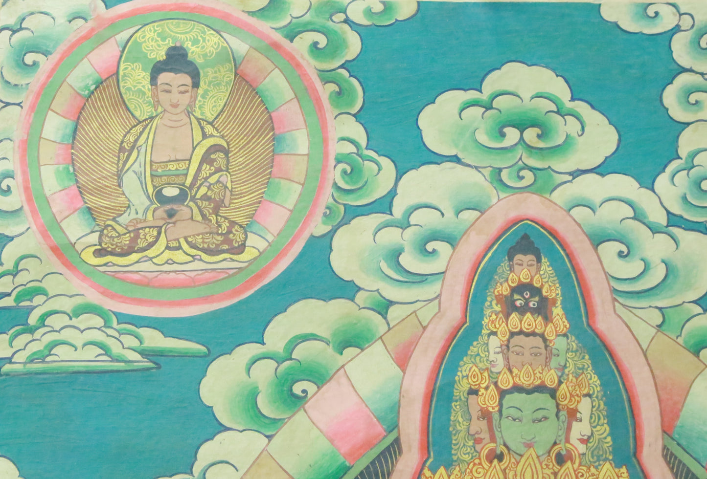 An Exquiste Painted Gold Eleven-faced Avalokiteshvara Thangka