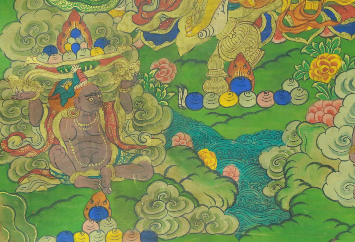 An Exquiste Painted Gold Mammon Thangka