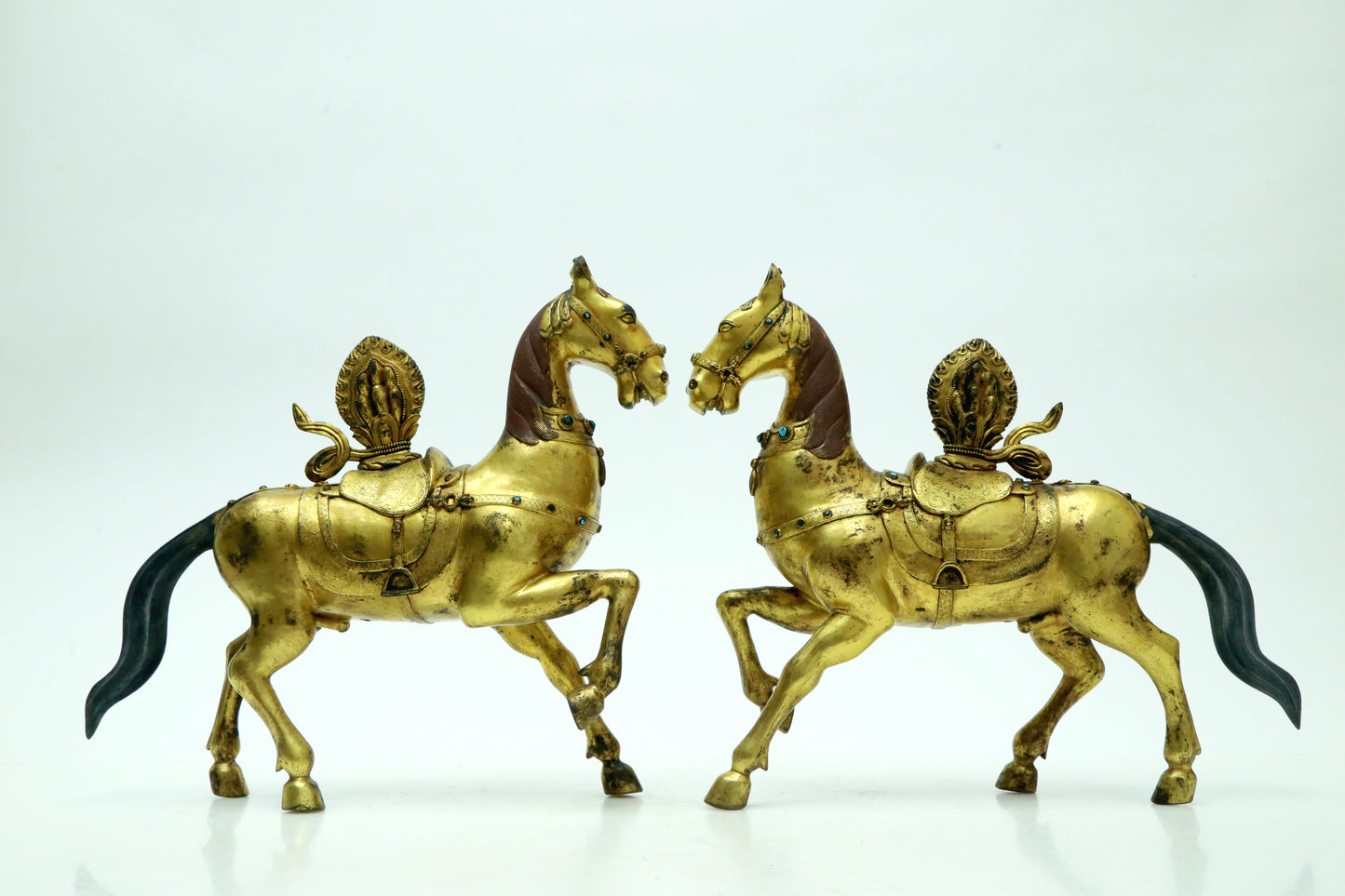 A Brilliant Pair Of Gilt-Bronze Horses