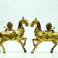 A Brilliant Pair Of Gilt-Bronze Horses