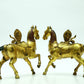 A Brilliant Pair Of Gilt-Bronze Horses