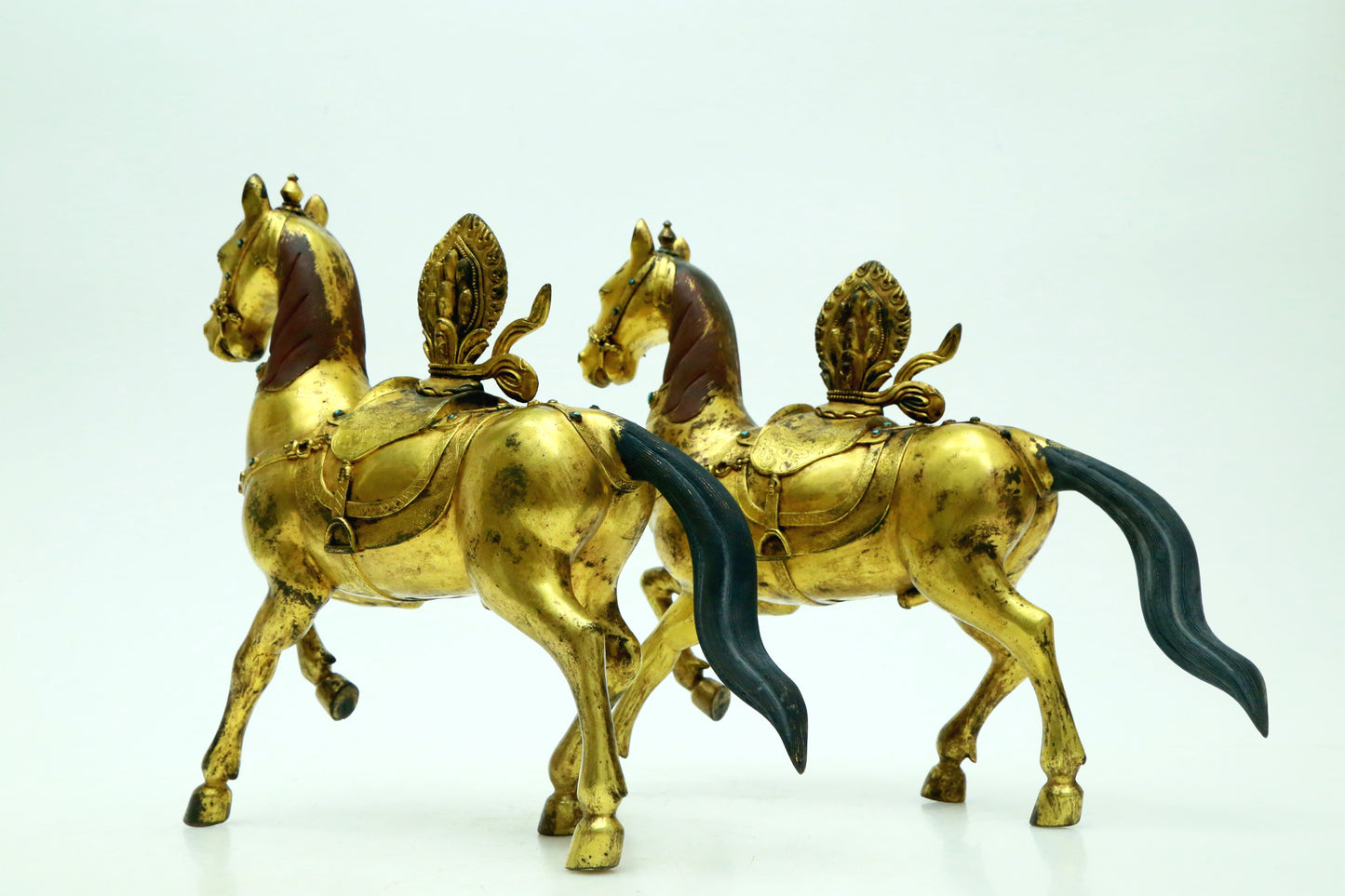 A Brilliant Pair Of Gilt-Bronze Horses