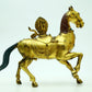 A Brilliant Pair Of Gilt-Bronze Horses