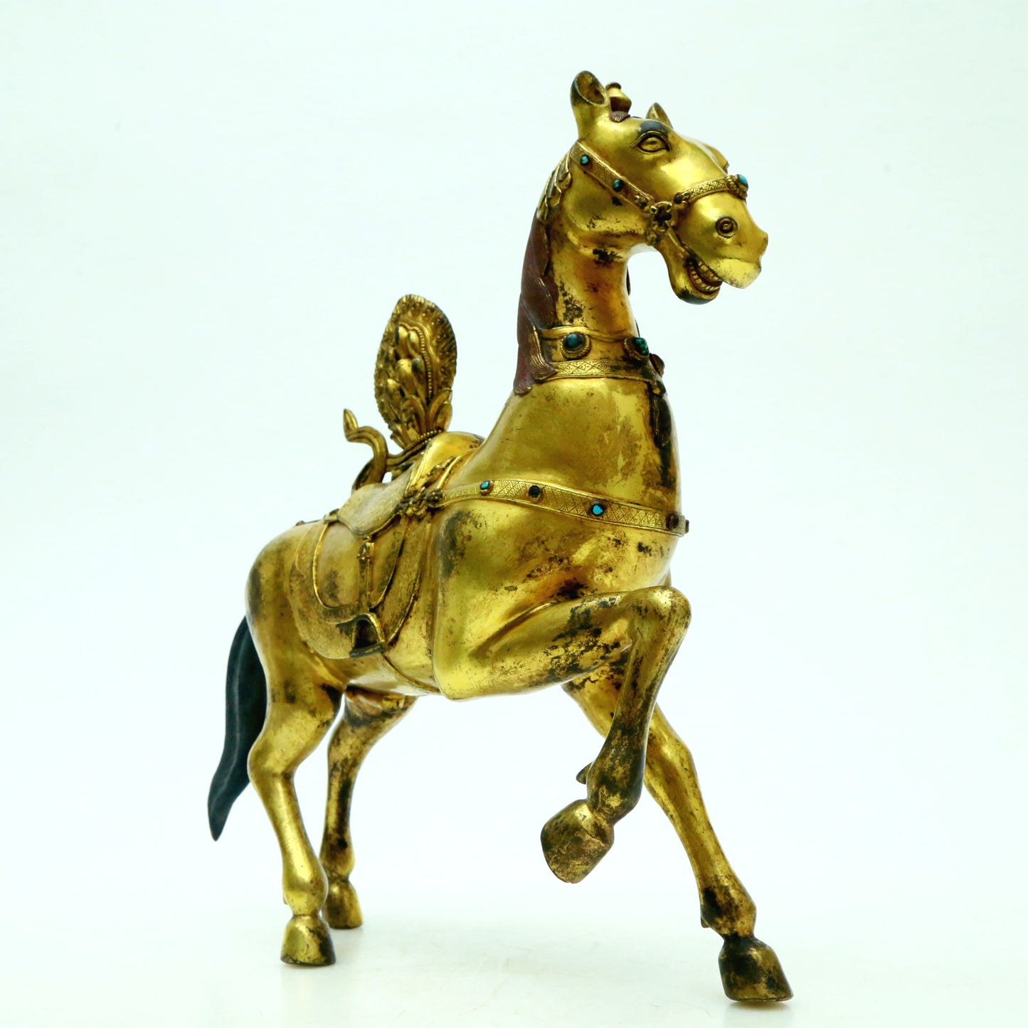 A Brilliant Pair Of Gilt-Bronze Horses