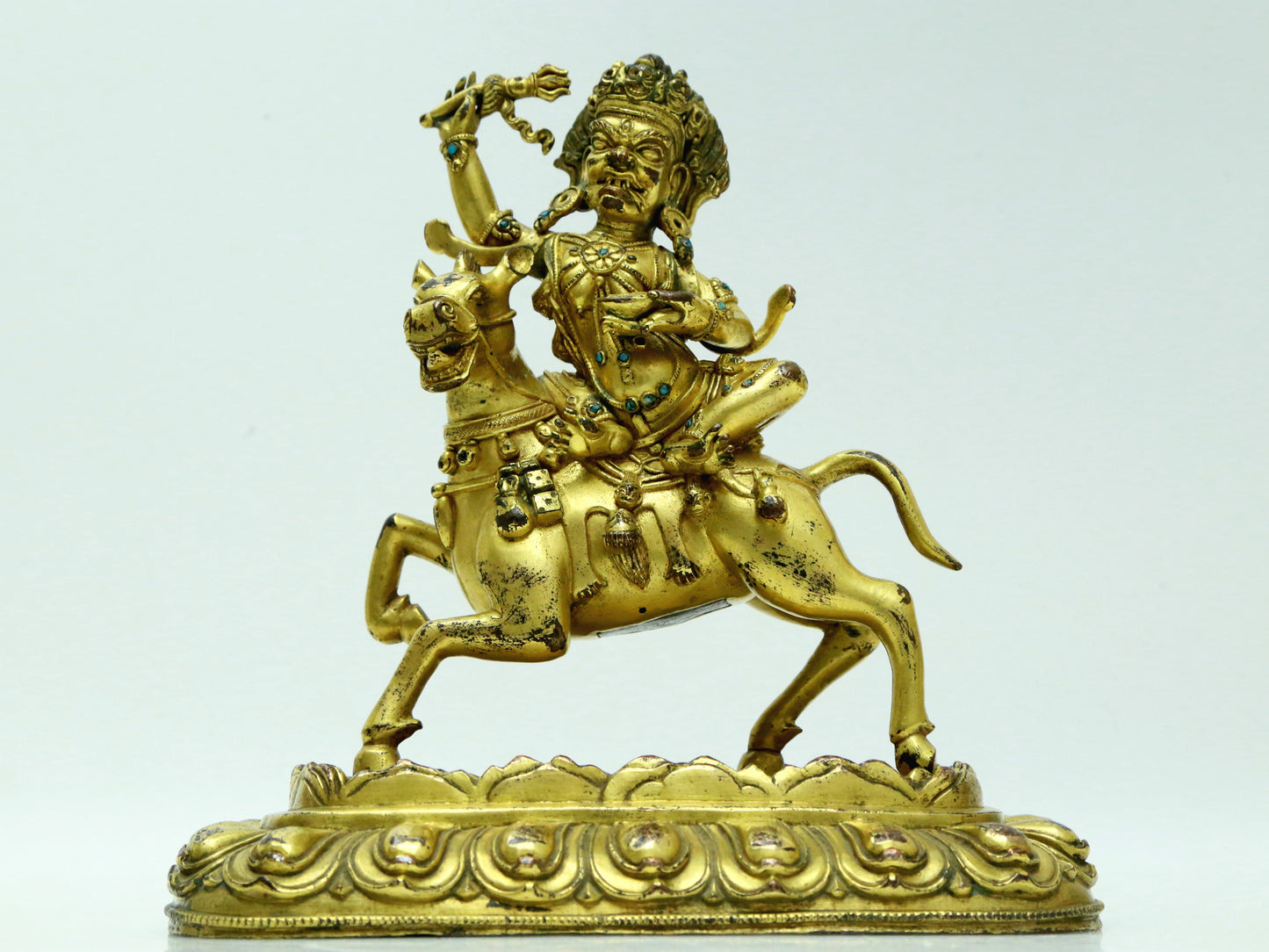 A Fabulous Gilt-Bronze Figure Of Kubera Seated On A Horse With Inscriptions