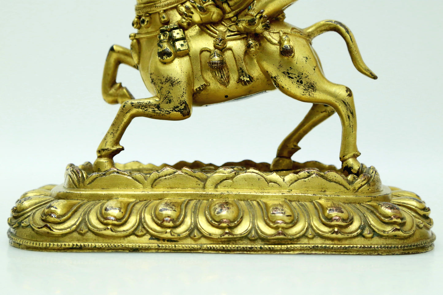 A Fabulous Gilt-Bronze Figure Of Kubera Seated On A Horse With Inscriptions