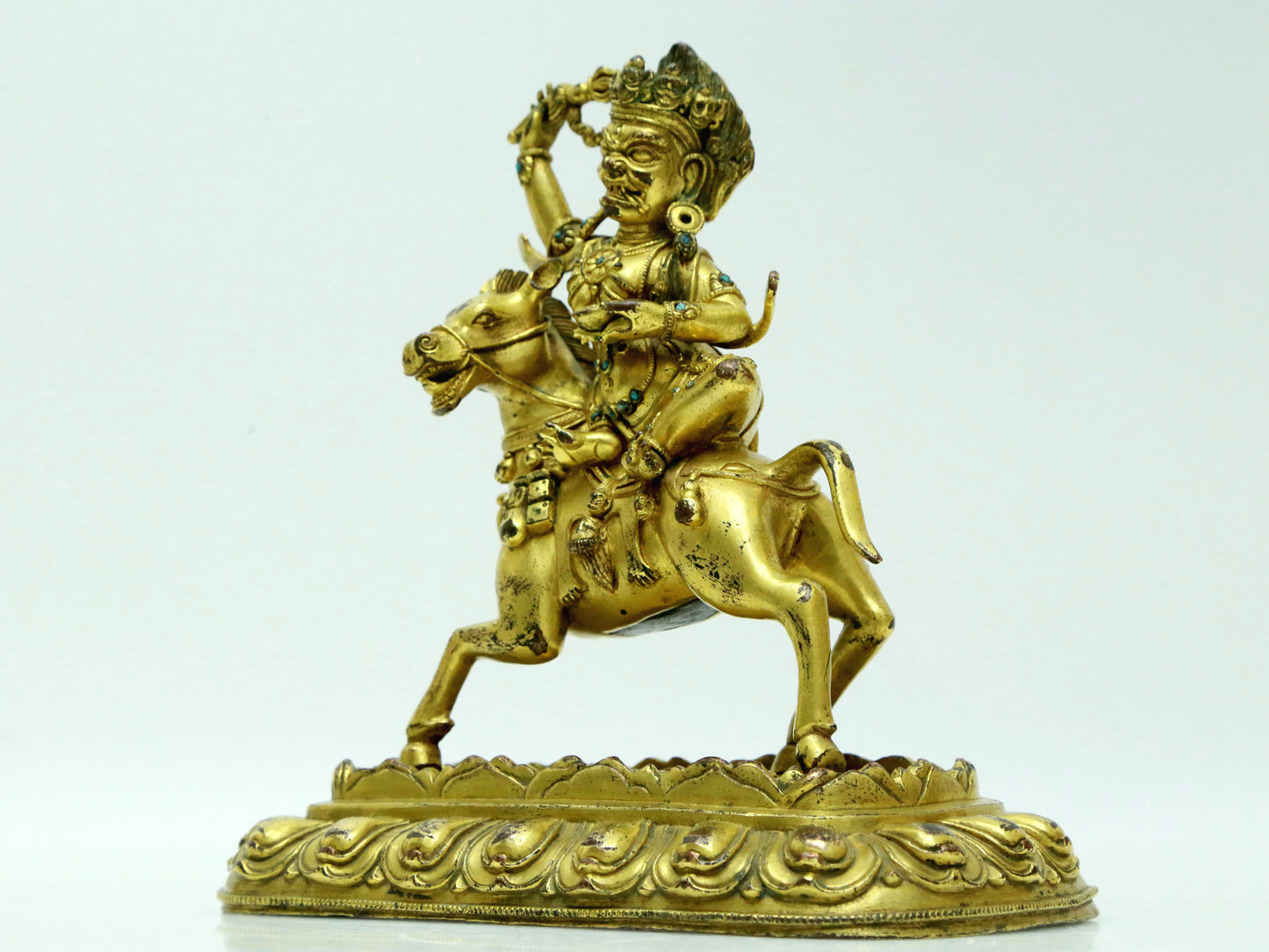 A Fabulous Gilt-Bronze Figure Of Kubera Seated On A Horse With Inscriptions