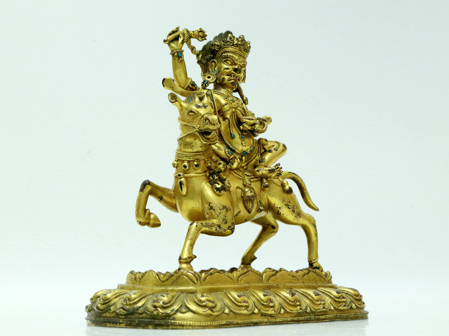 A Fabulous Gilt-Bronze Figure Of Kubera Seated On A Horse With Inscriptions