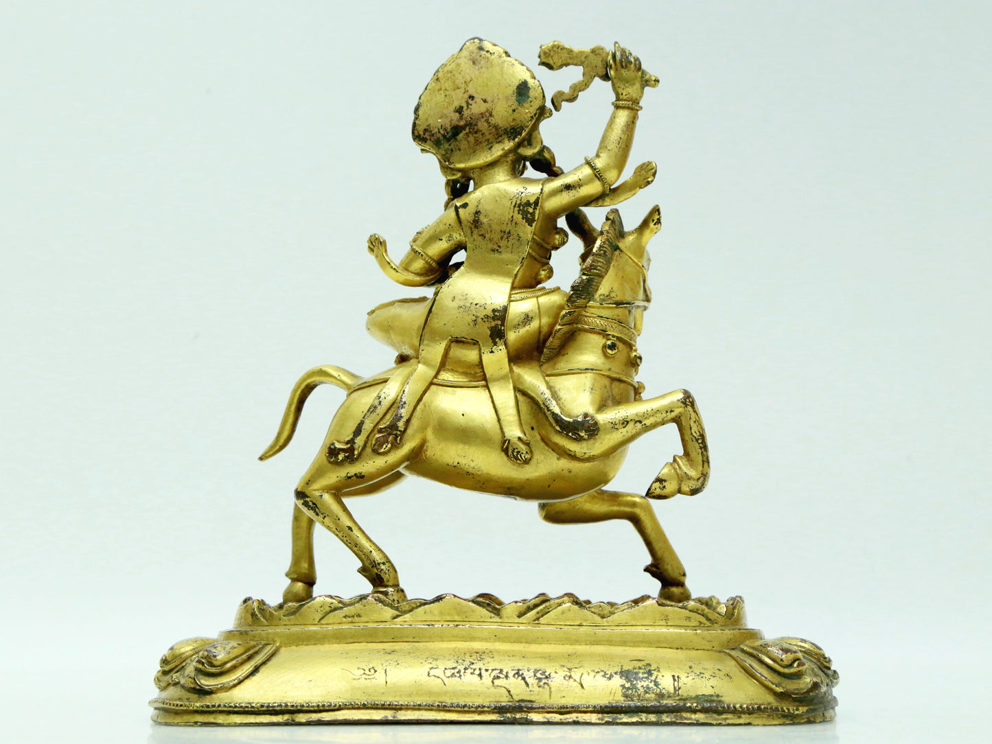 A Fabulous Gilt-Bronze Figure Of Kubera Seated On A Horse With Inscriptions