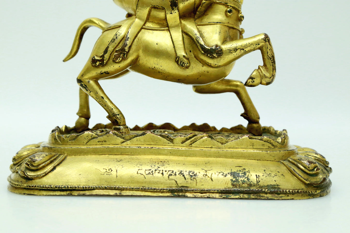 A Fabulous Gilt-Bronze Figure Of Kubera Seated On A Horse With Inscriptions