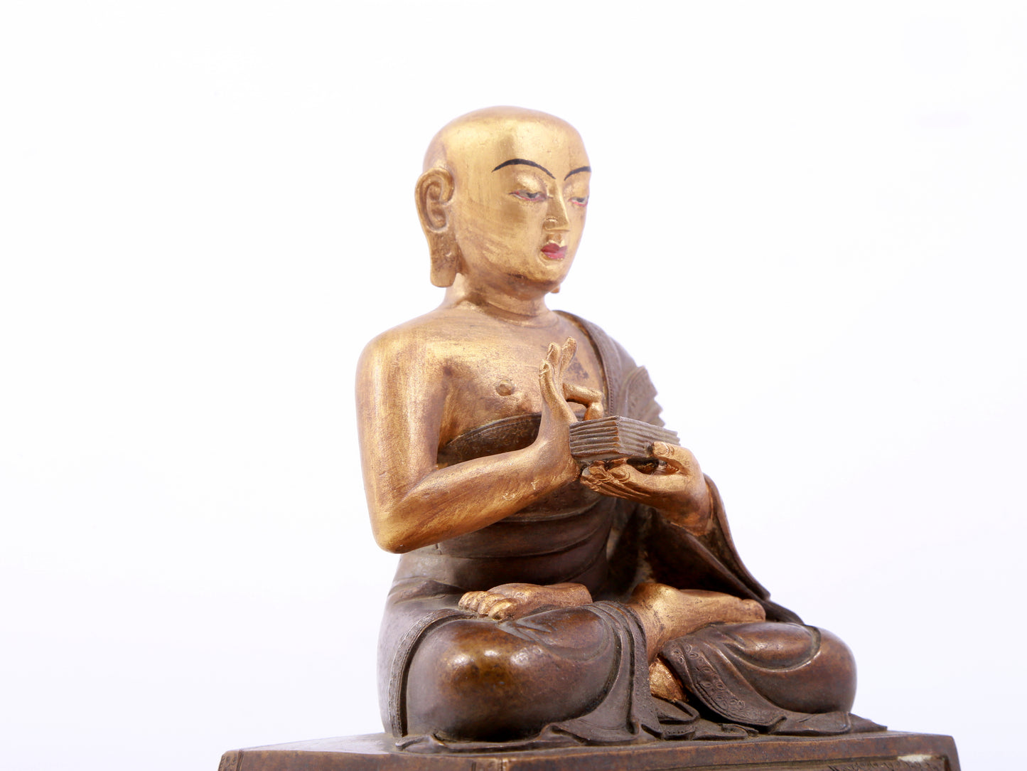 A gilt bronze Arhat statue