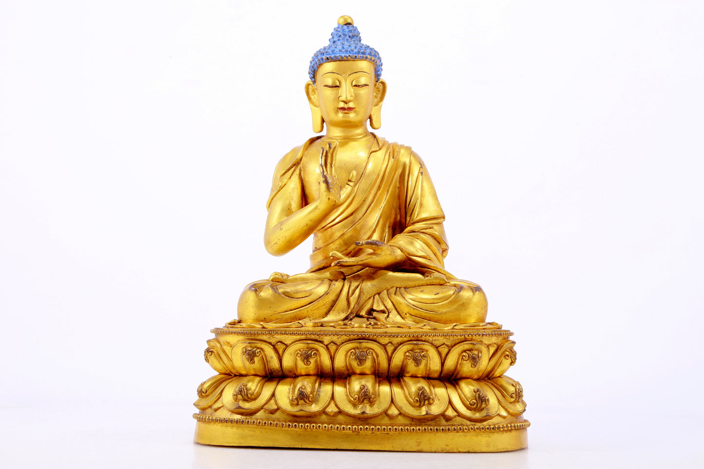 A gilt bronze statue of Gautama Buddha