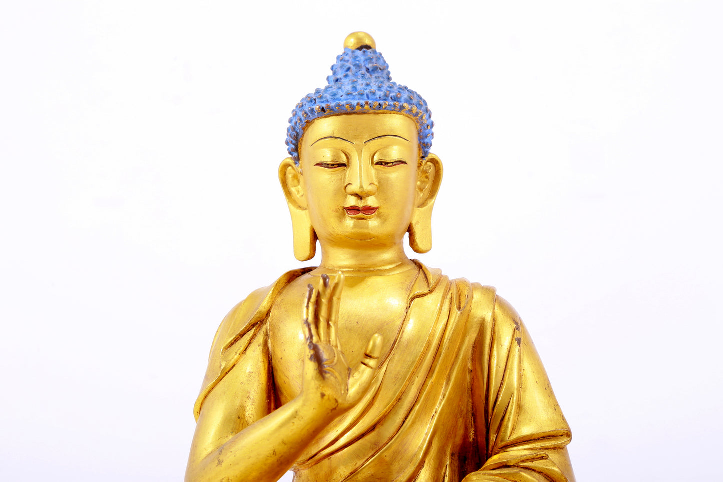 A gilt bronze statue of Gautama Buddha