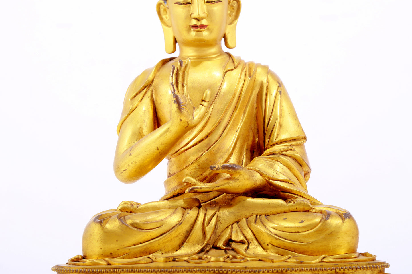 A gilt bronze statue of Gautama Buddha