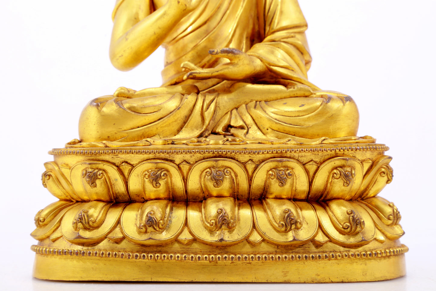 A gilt bronze statue of Gautama Buddha