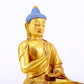 A gilt bronze statue of Gautama Buddha