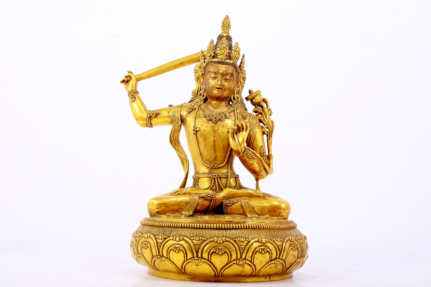 A gilt bronze statue of Manjushri Bodhisattva