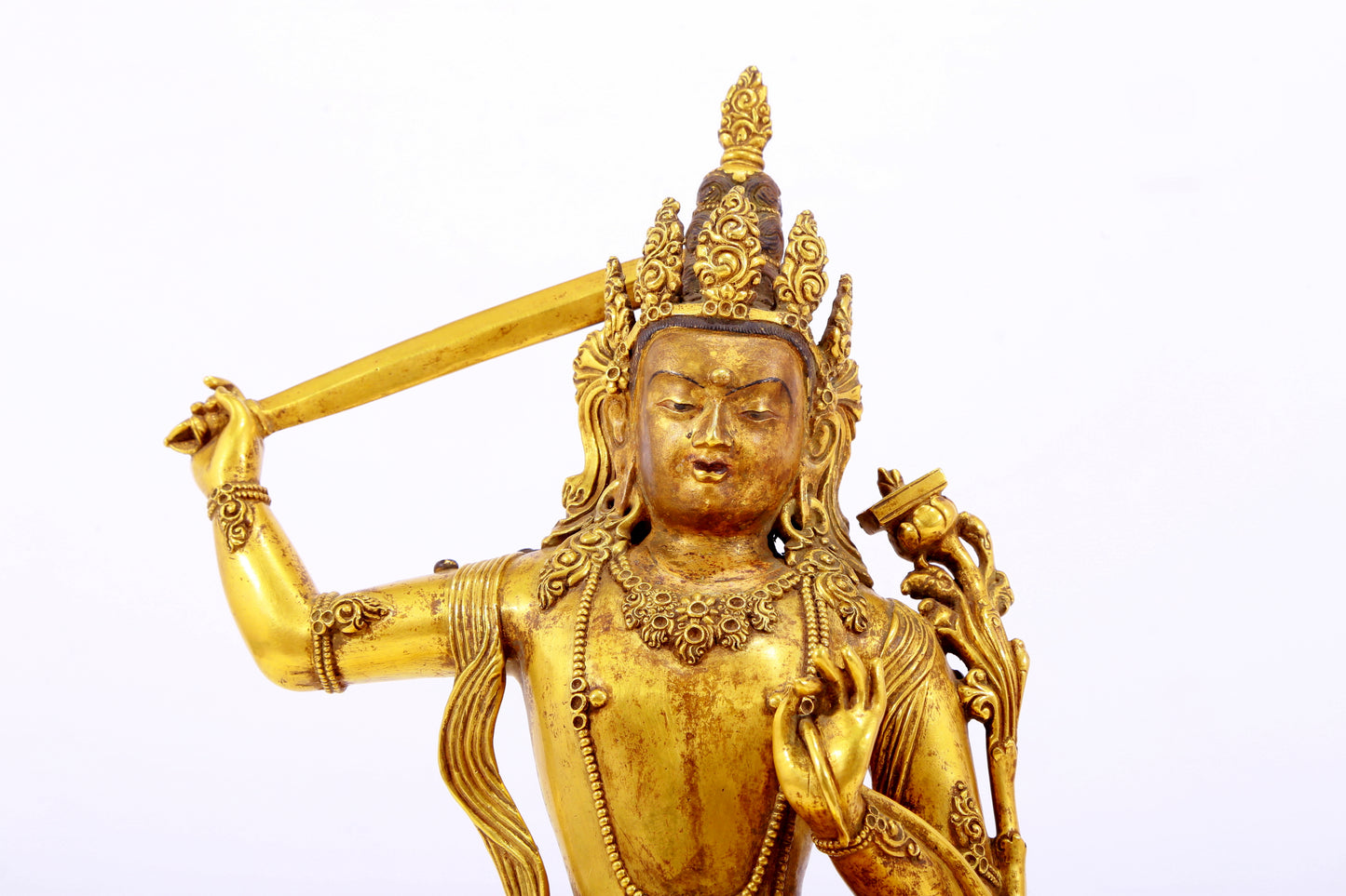 A gilt bronze statue of Manjushri Bodhisattva