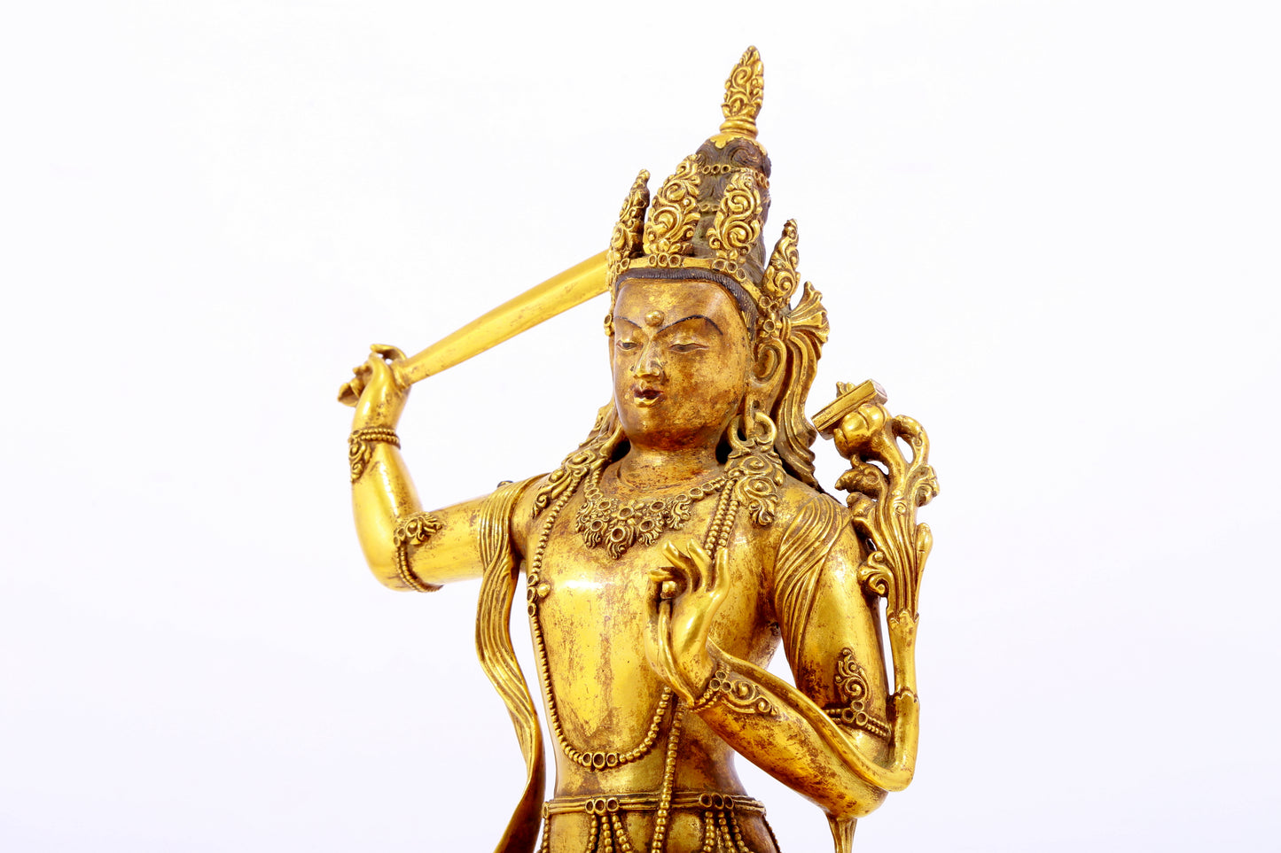 A gilt bronze statue of Manjushri Bodhisattva