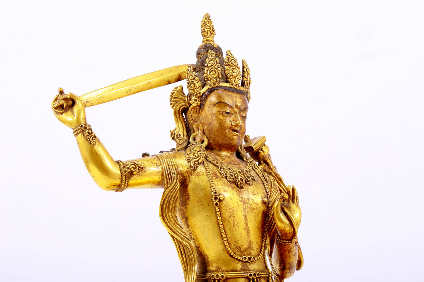 A gilt bronze statue of Manjushri Bodhisattva