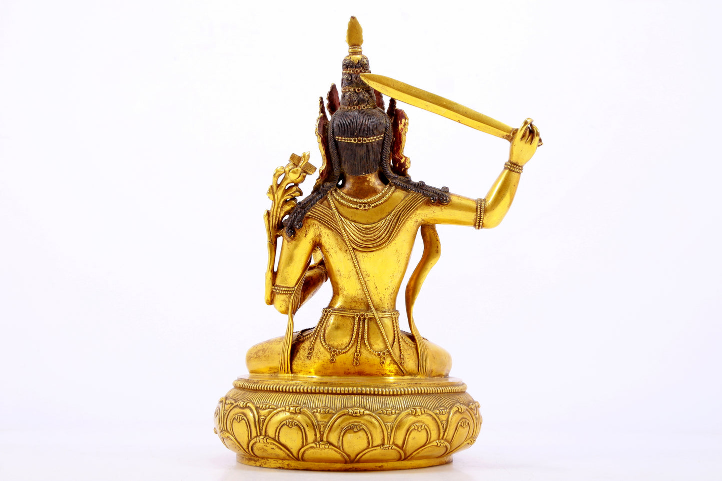 A gilt bronze statue of Manjushri Bodhisattva