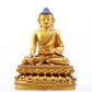 A gilt bronze statue of Gautama Buddha