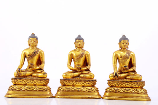 A Brilliant Set Of Three Gilt-Bronze Figures Of Buddha