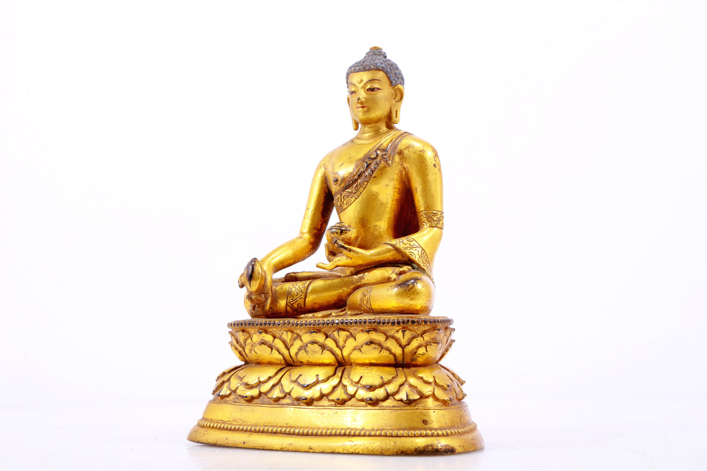 A Brilliant Set Of Three Gilt-Bronze Figures Of Buddha