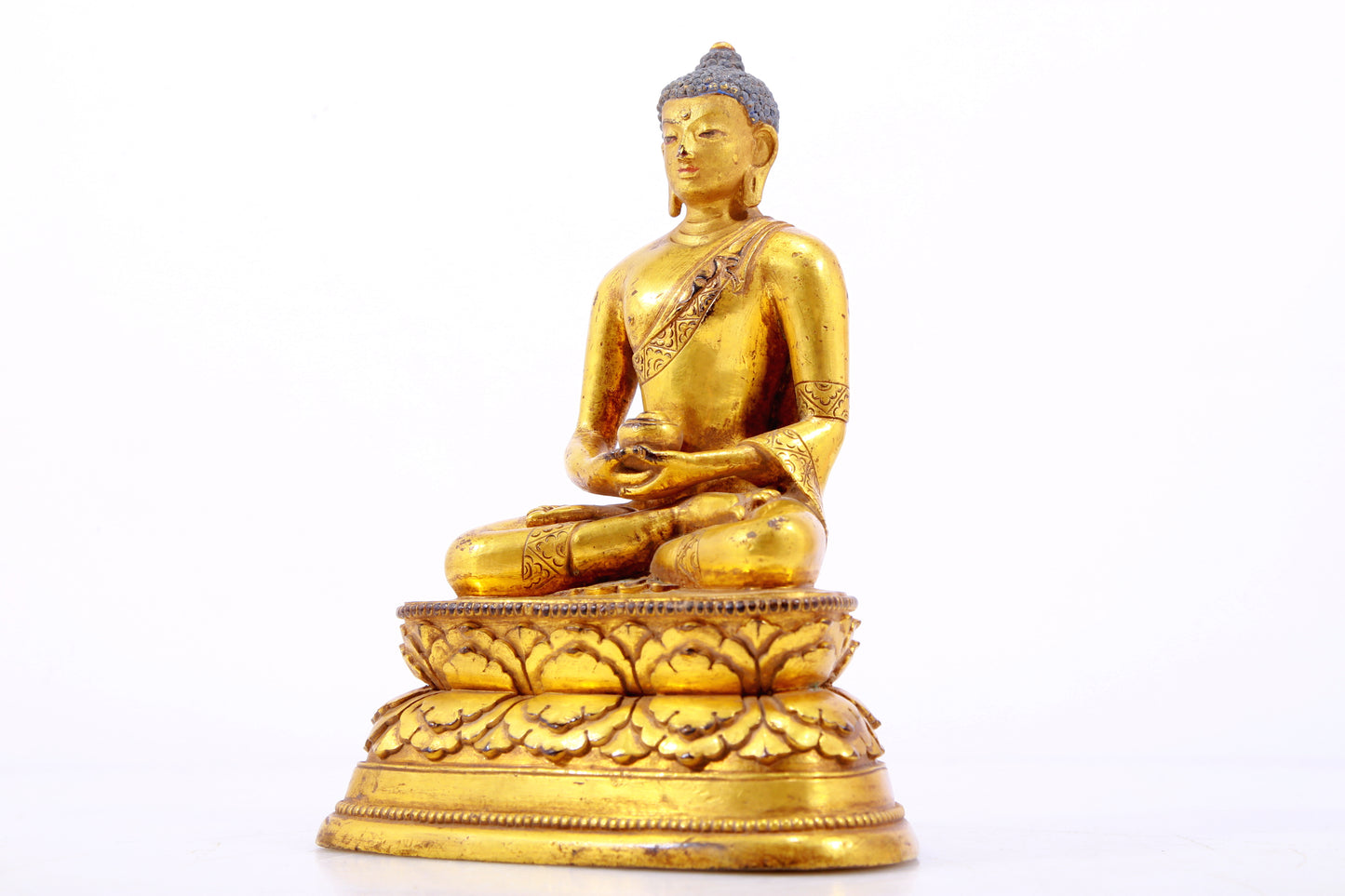 A Brilliant Set Of Three Gilt-Bronze Figures Of Buddha