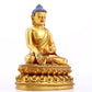 A gilt bronze statue of Gautama Buddha